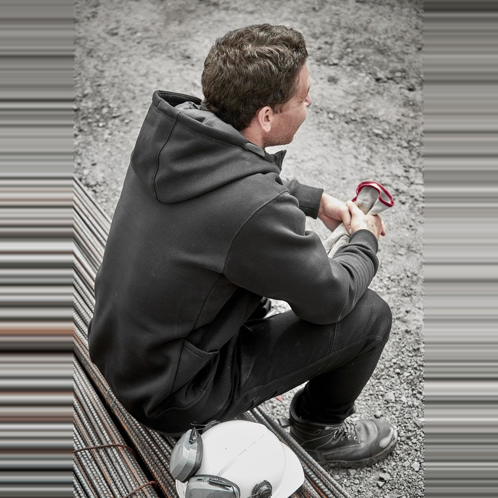 Syzmik Unisex Zip Front Multi-Pocket Hoodie ZT468 in Black/Charcoal, worn by model, view 6