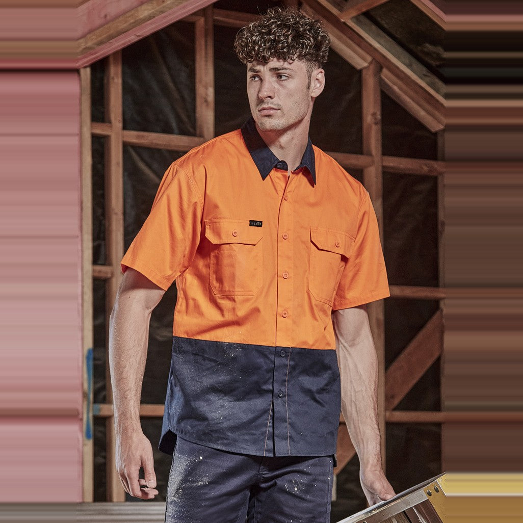 Syzmik Mens Hi Vis Short Sleeve Shirt ZW115 in Orange/Navy, worn by model