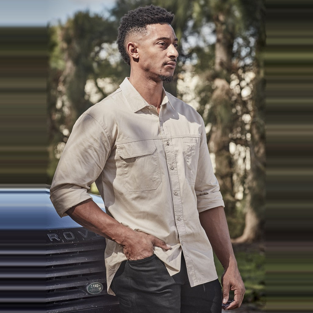 Syzmik Mens Lightweight Tradie Long Sleeve Shirt ZW121 in Sand, worn by model