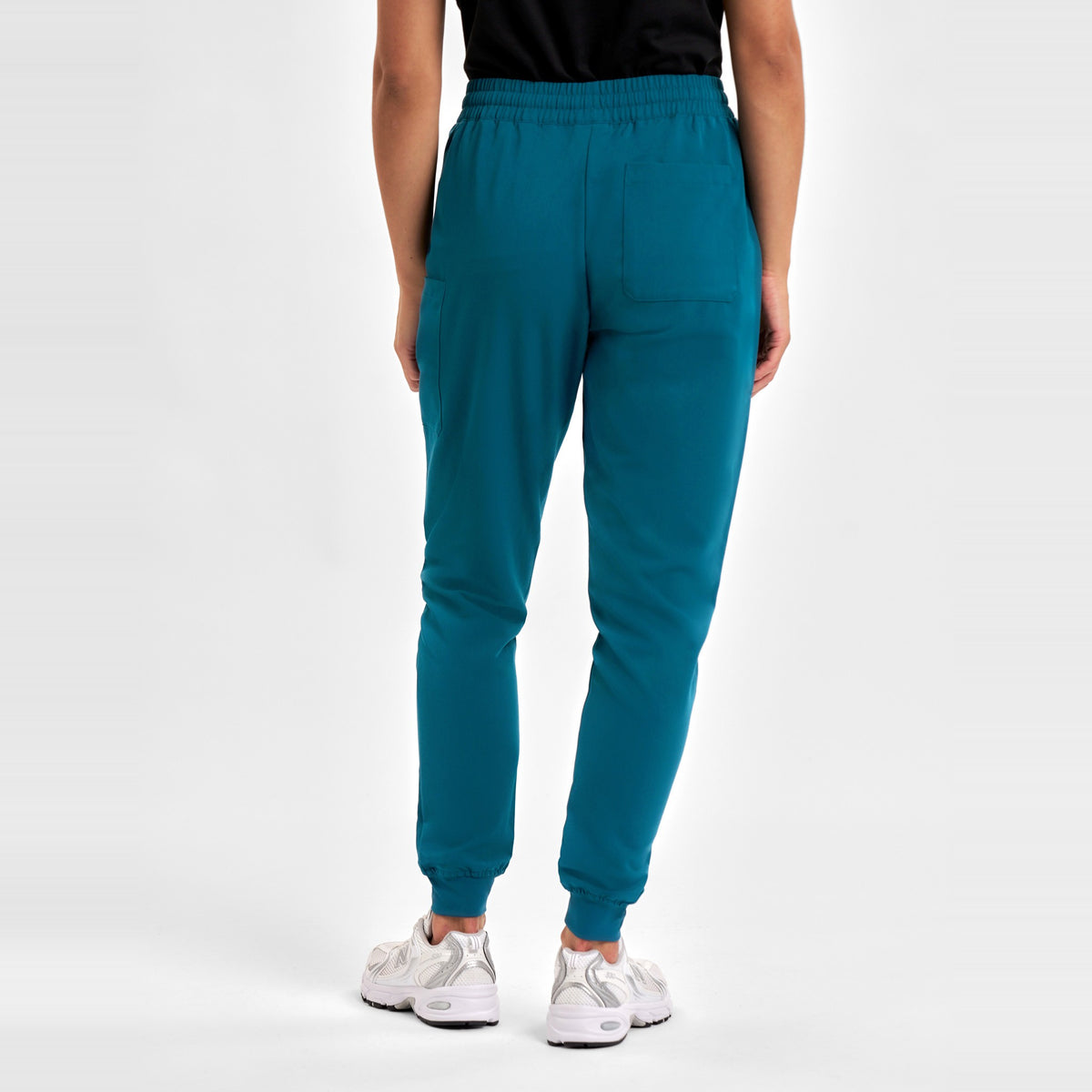 Inaura Pulse Womens Jogger Scrub Pant CL541LL in Caribbean Blue, worn by model, view 4