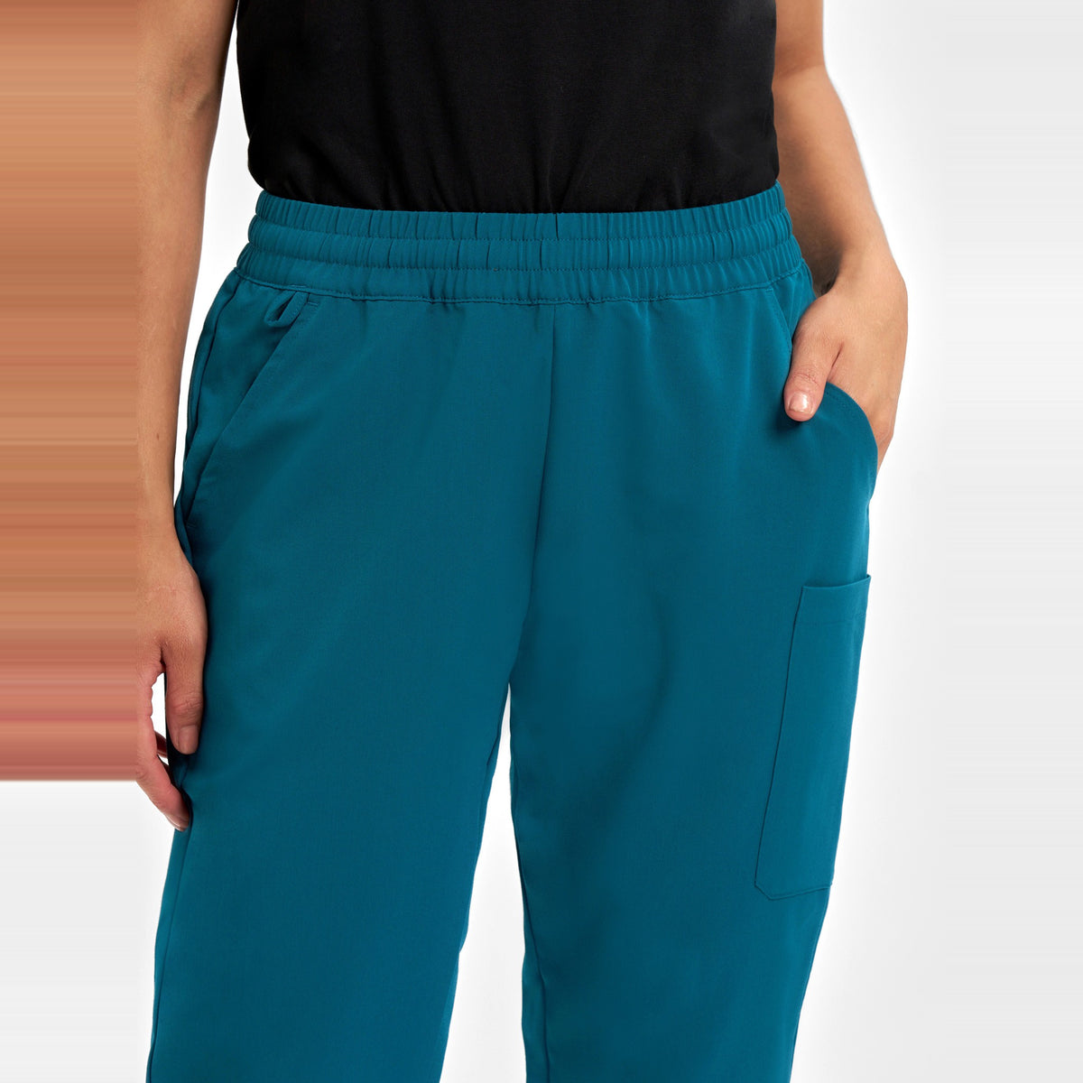 Inaura Pulse Womens Jogger Scrub Pant CL541LL in Caribbean Blue, worn by model, view 5