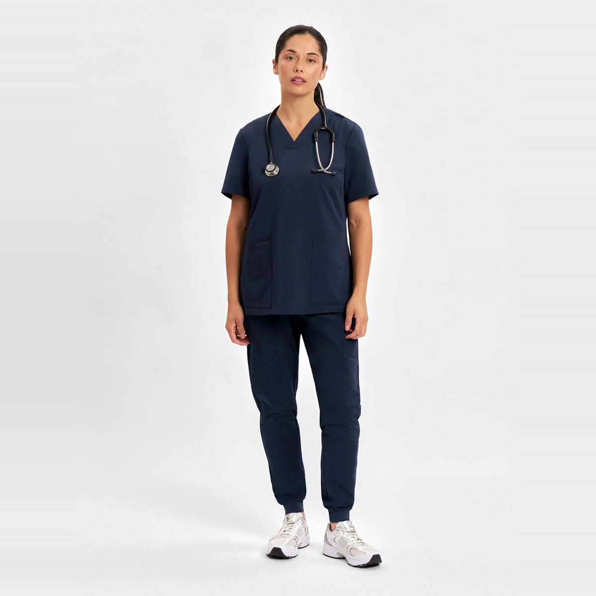Inaura Pulse Womens Jogger Scrub Pant CL541LL in Midnight Navy, worn by model