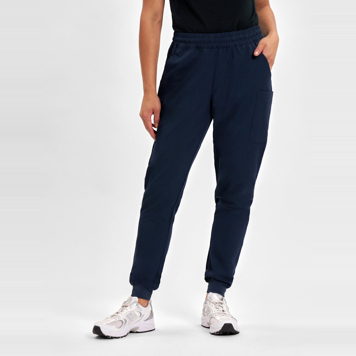 Inaura Pulse Womens Jogger Scrub Pant CL541LL in Midnight Navy, worn by model, view 2