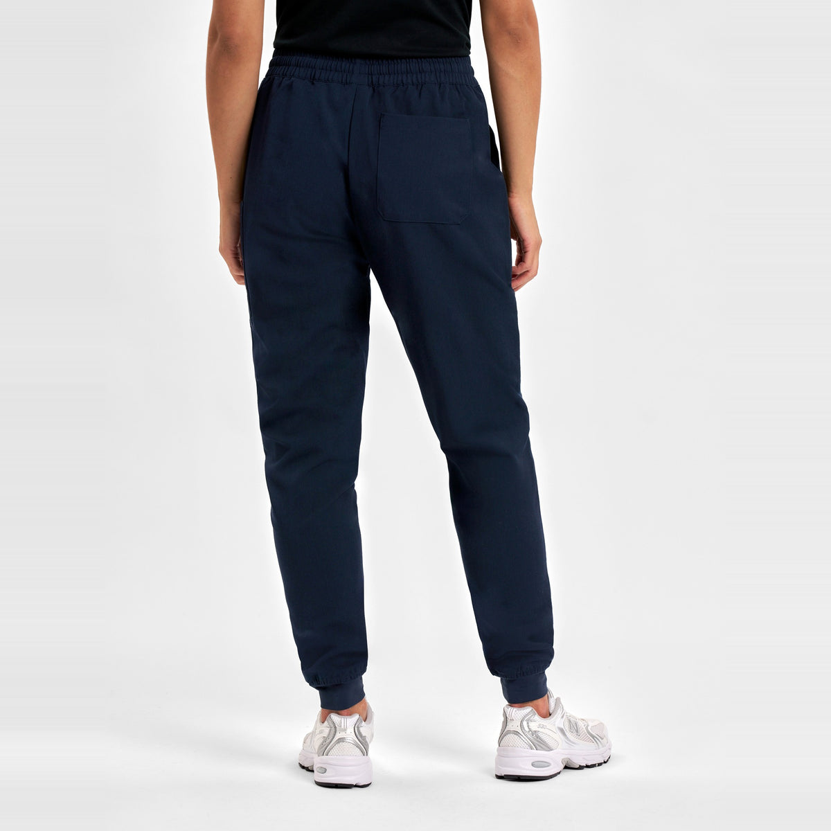 Inaura Pulse Womens Jogger Scrub Pant CL541LL in Midnight Navy, worn by model, view 4