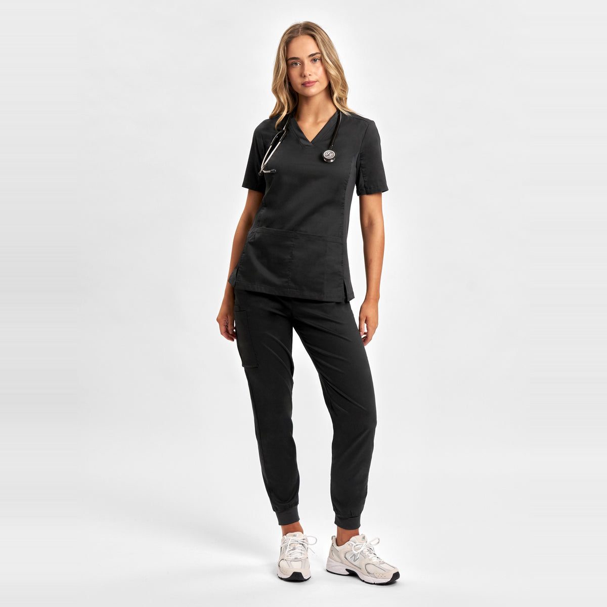 Inaura Riley Womens Slim Leg Jogger Scrub Pant CSP042LL in Black, worn by model
