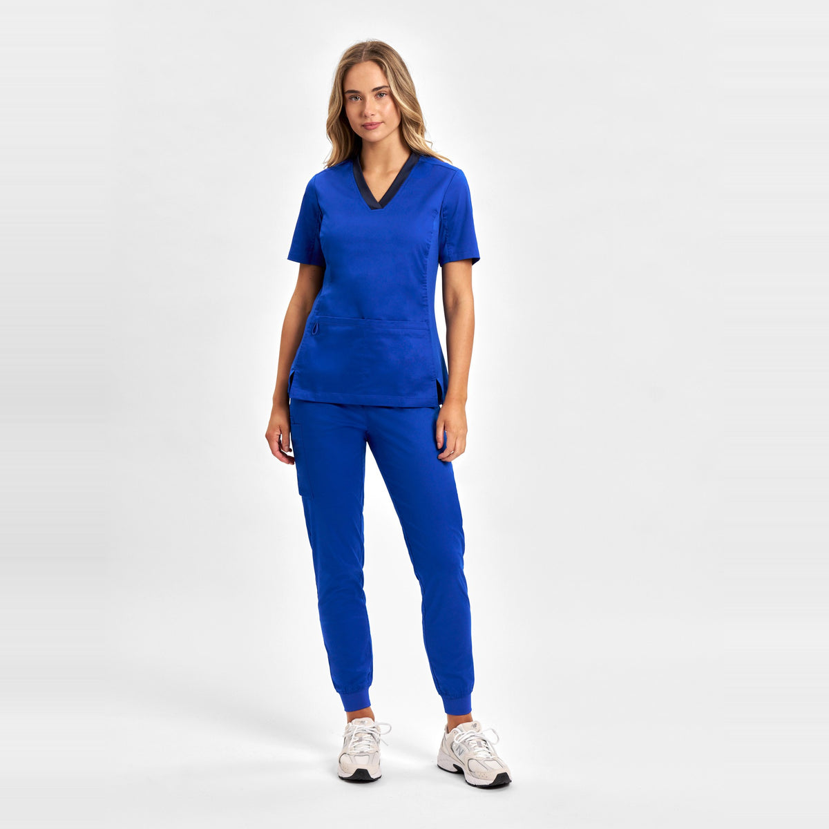 Inaura Riley Womens Slim Leg Jogger Scrub Pant CSP042LL in Electric Blue, worn by model