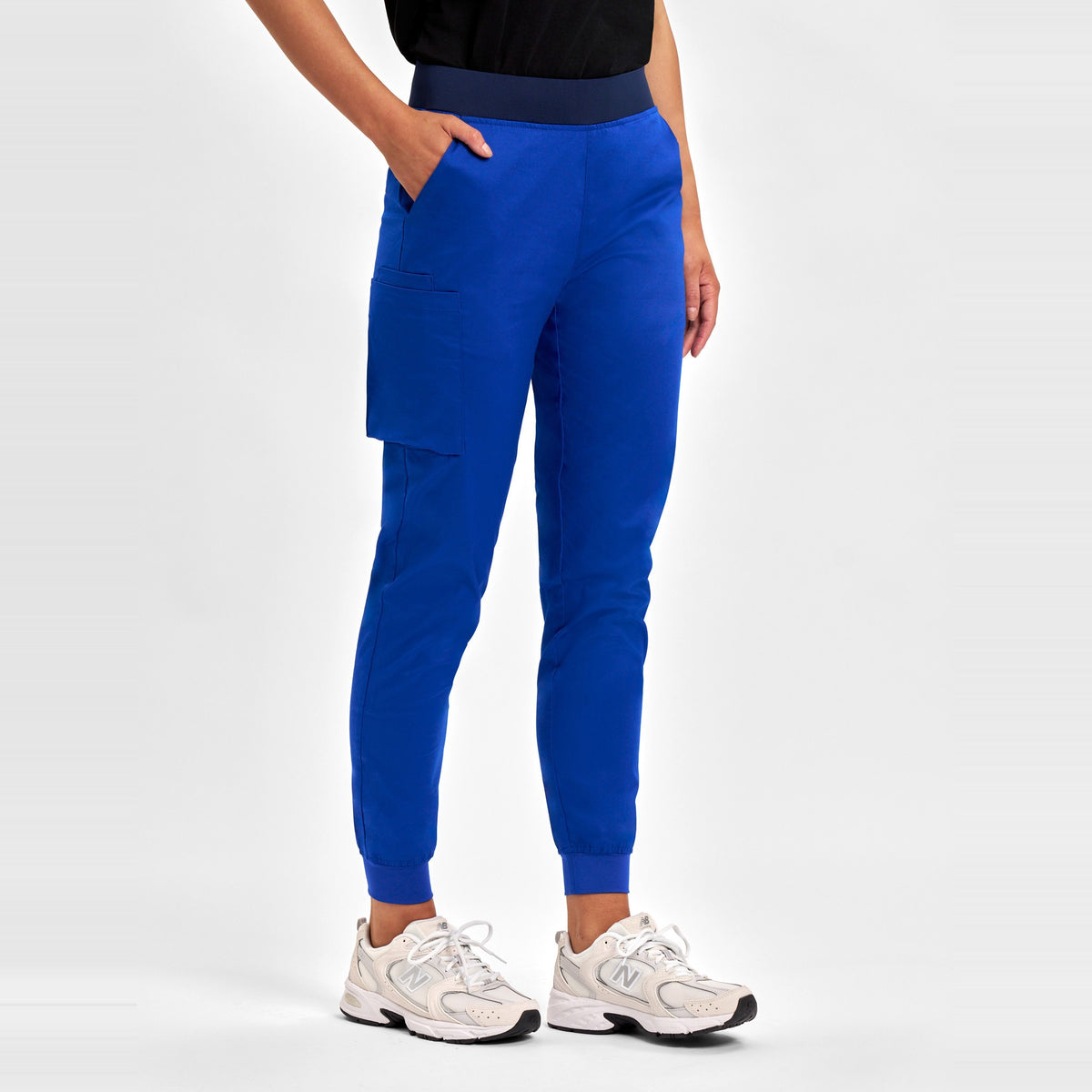 Inaura Riley Womens Slim Leg Jogger Scrub Pant CSP042LL in Electric Blue, worn by model, view 3