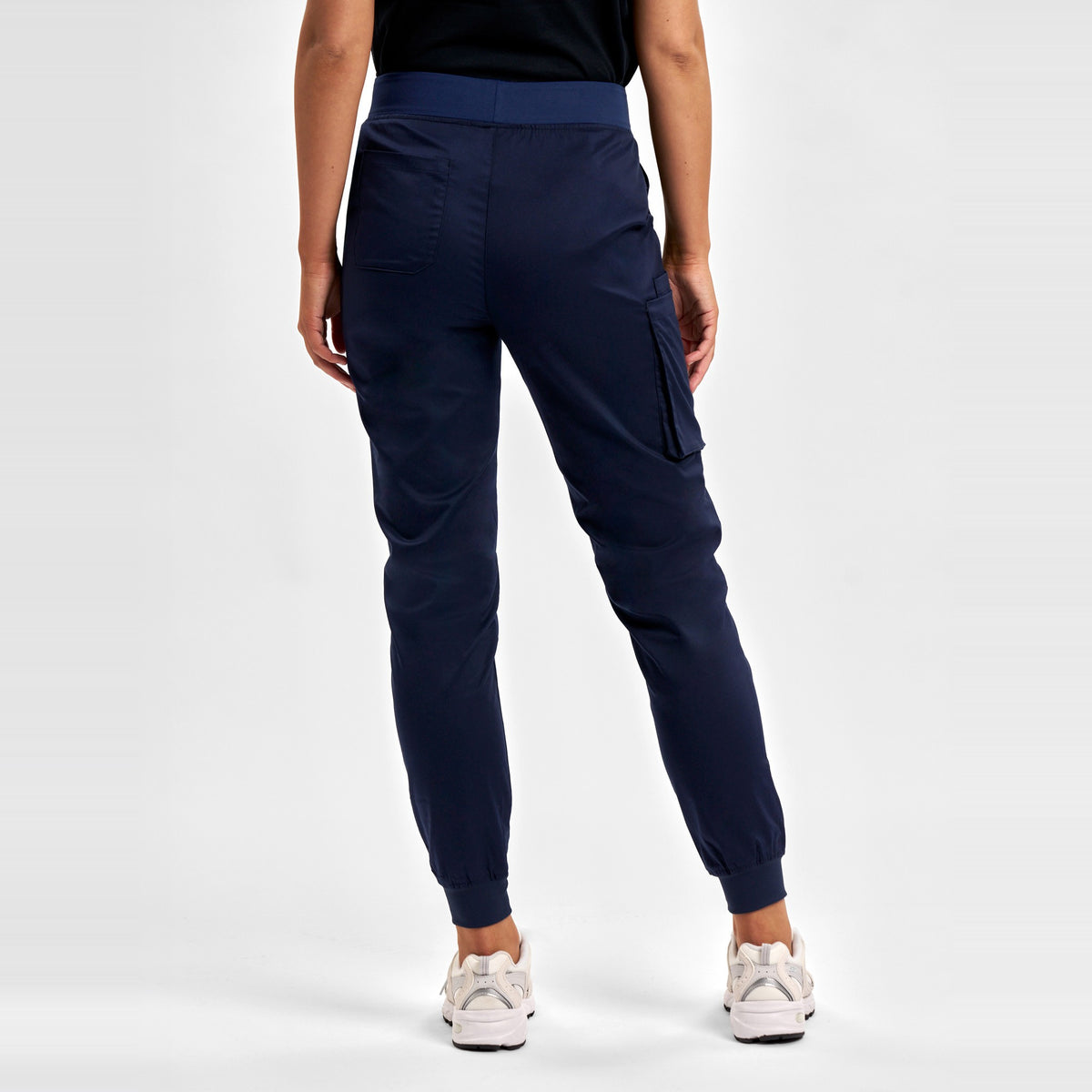 Inaura Riley Womens Slim Leg Jogger Scrub Pant CSP042LL in Midnight Navy, worn by model, view 4