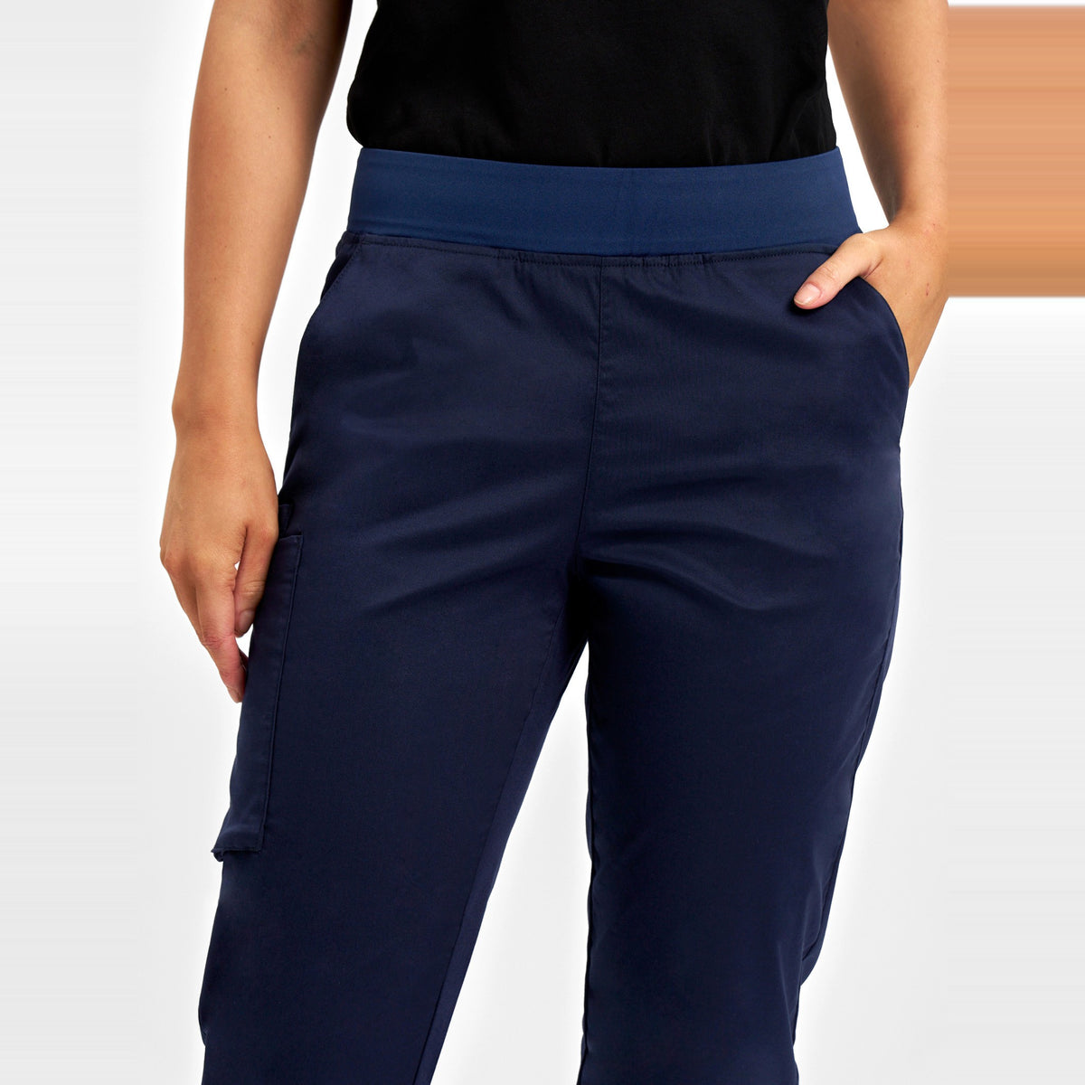Inaura Riley Womens Slim Leg Jogger Scrub Pant CSP042LL in Midnight Navy, worn by model, view 5