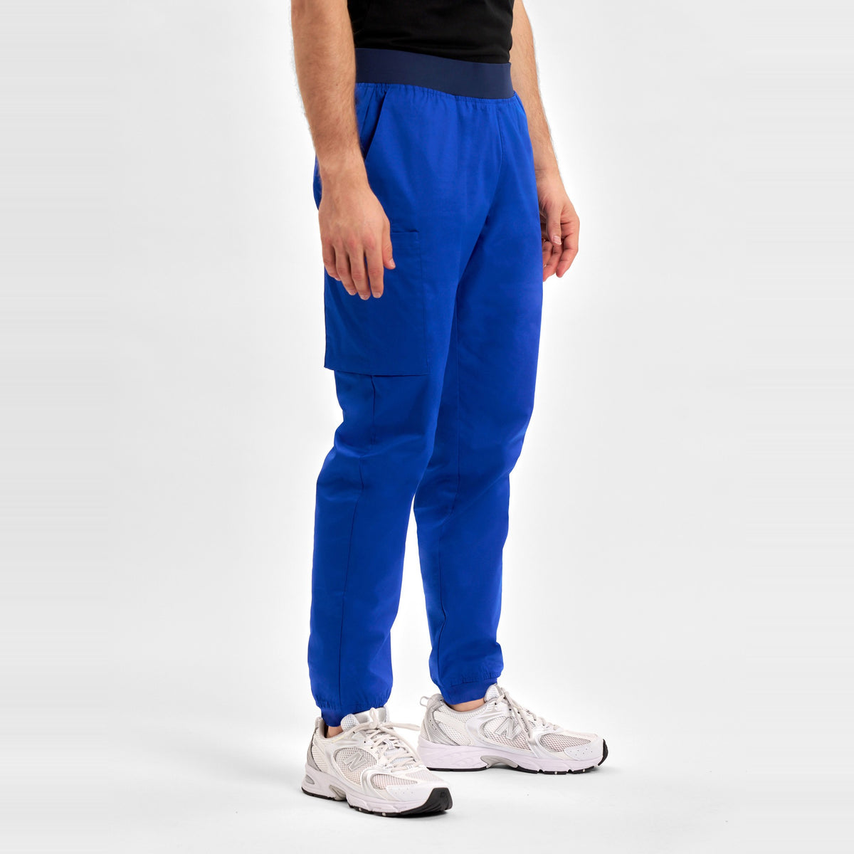 Inaura Riley Mens Slim Leg Jogger Scrub Pant CSP042ML in Electric Blue, worn by model, view 3