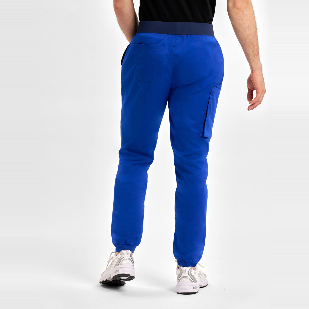 Inaura Riley Mens Slim Leg Jogger Scrub Pant CSP042ML in Electric Blue, worn by model, view 4