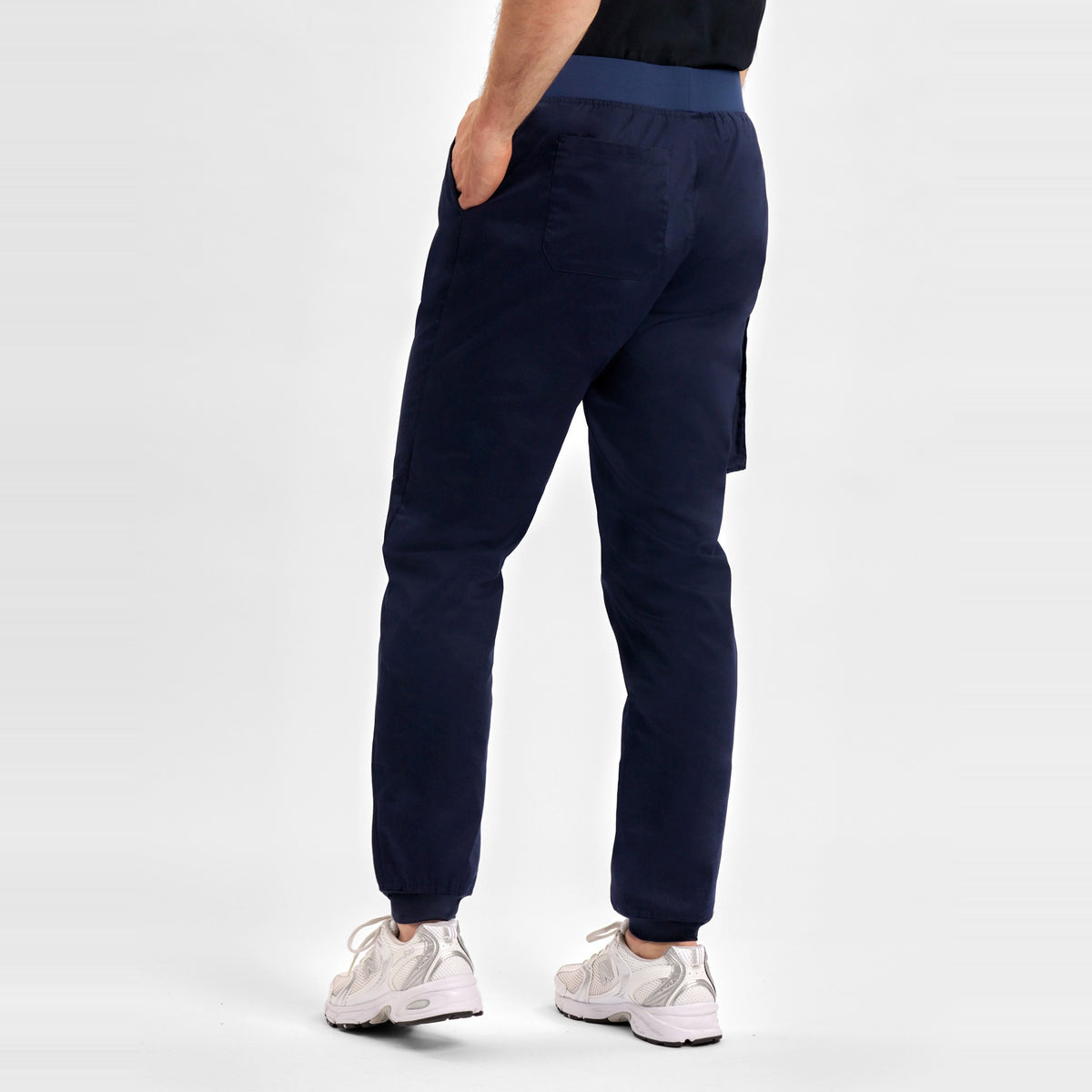 Inaura Riley Mens Slim Leg Jogger Scrub Pant CSP042ML in Midnight Navy, worn by model, view 4