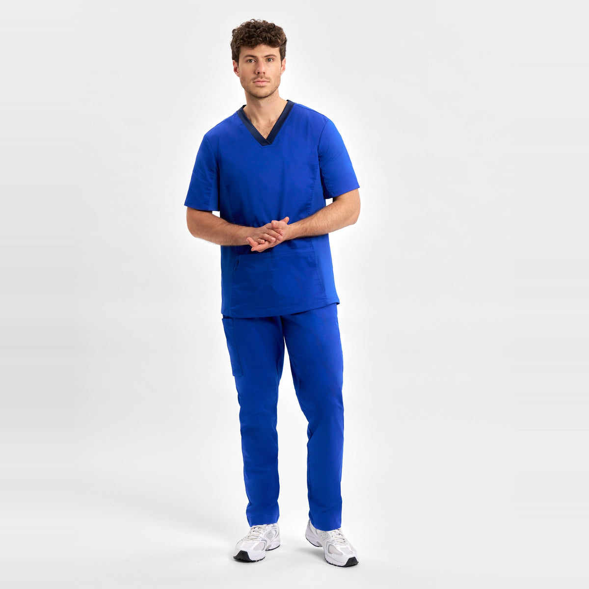 Inaura Riley Mens Straight Leg Scrub Pant CSP047ML in Electric Blue, worn by model