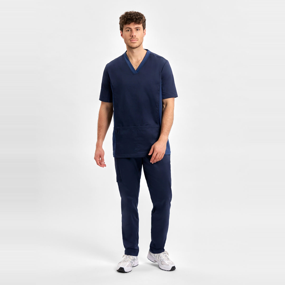 Inaura Riley Mens Straight Leg Scrub Pant CSP047ML in Midnight Navy, worn by model