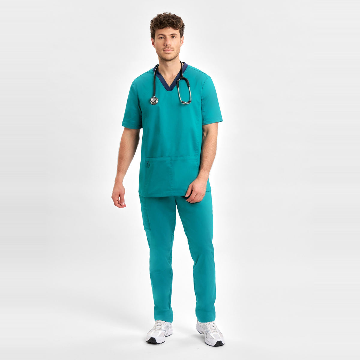 Inaura Riley Mens Straight Leg Scrub Pant CSP047ML in Teal, worn by model