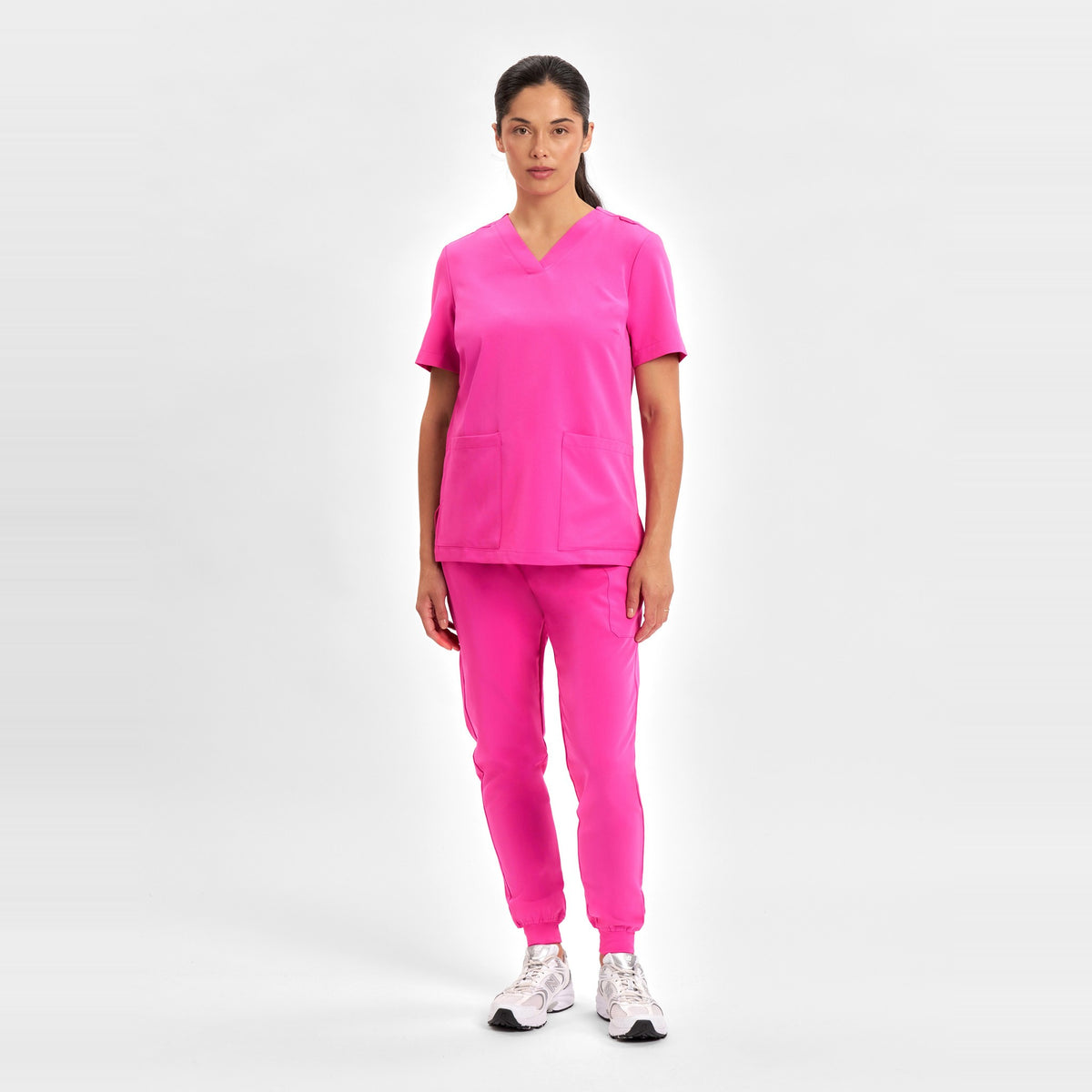 Inaura Pink Womens Jogger Scrub Pant CSP241LL in Pink, worn by model