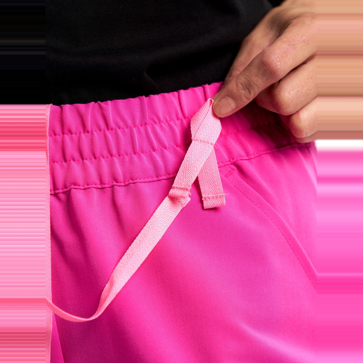 Inaura Pink Womens Jogger Scrub Pant CSP241LL in Pink, worn by model, view 6
