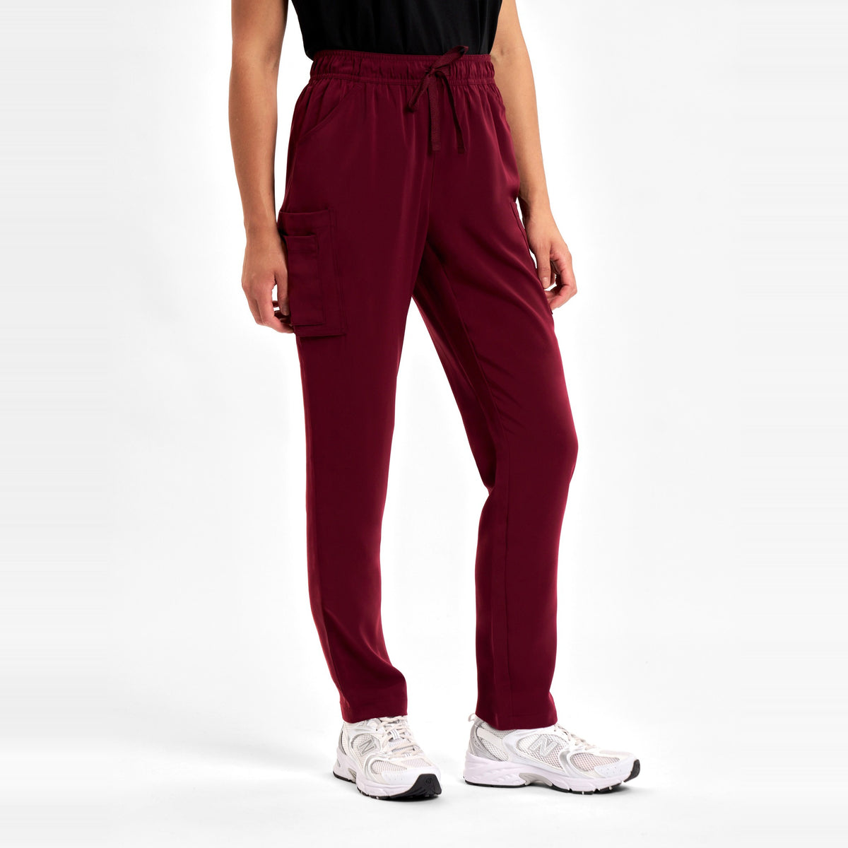 Inaura Avery Womens Slim Leg Scrub Pant CSP943LL in Burgundy, worn by model, view 3
