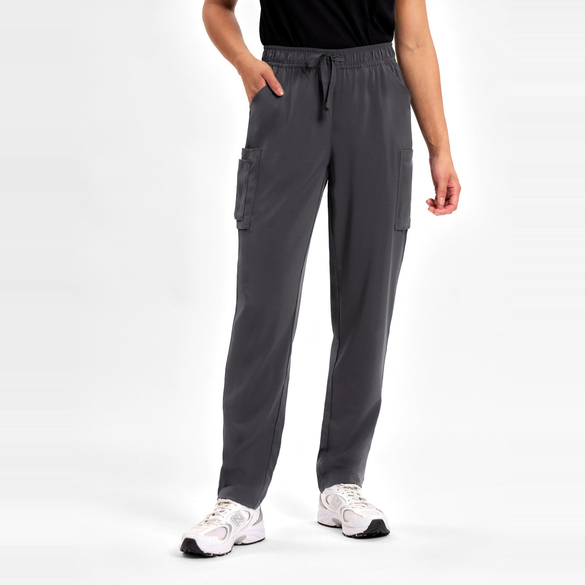 Inaura Avery Womens Slim Leg Scrub Pant CSP943LL in Charcoal, worn by model, view 2