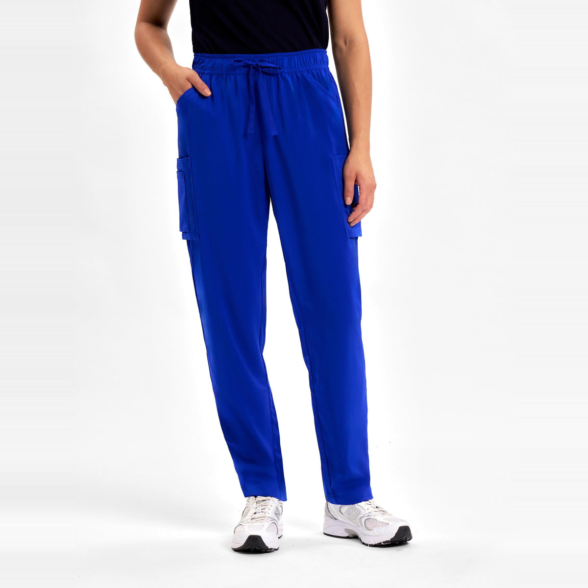 Inaura Avery Womens Slim Leg Scrub Pant CSP943LL in Electric Blue, worn by model, view 2