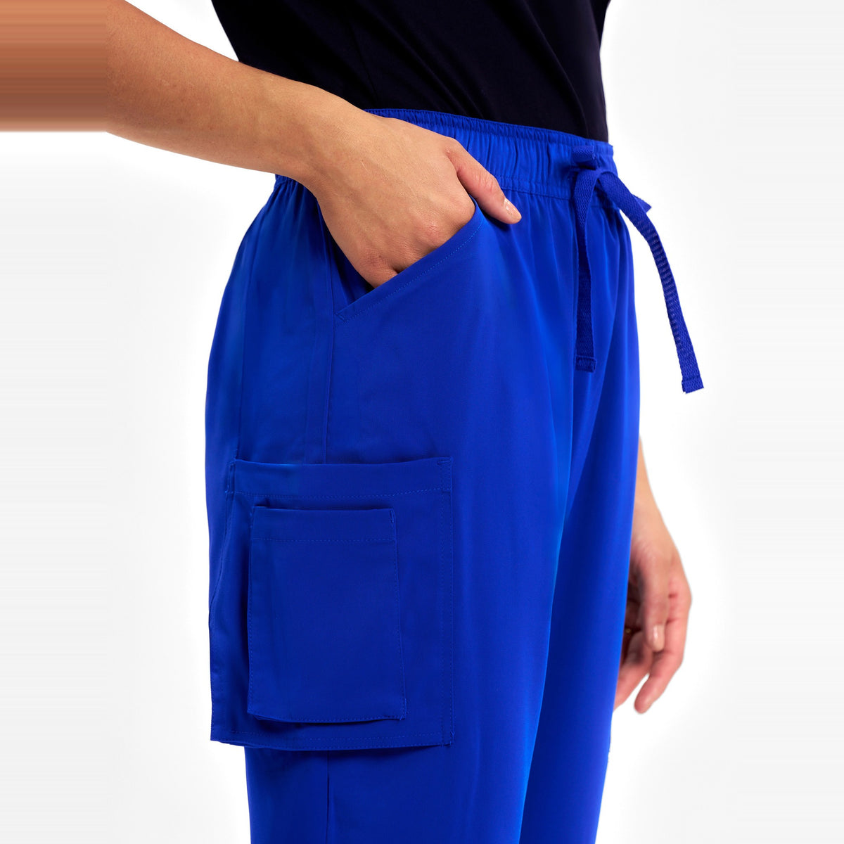 Inaura Avery Womens Slim Leg Scrub Pant CSP943LL in Electric Blue, worn by model, view 5