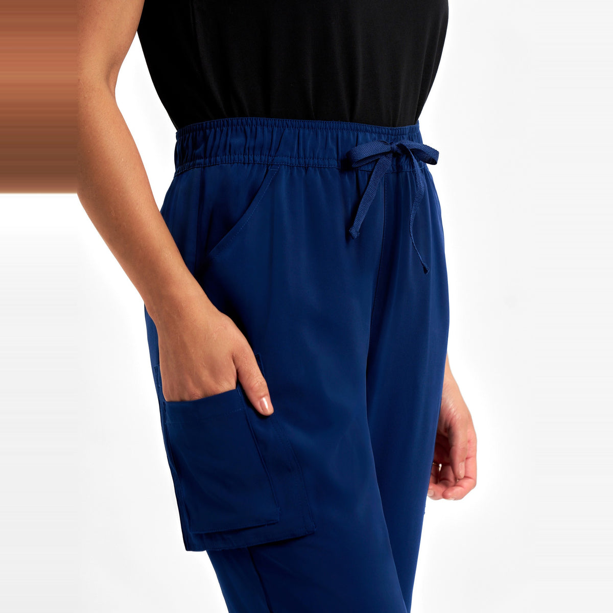 Inaura Avery Womens Slim Leg Scrub Pant CSP943LL in Navy, worn by model, view 5