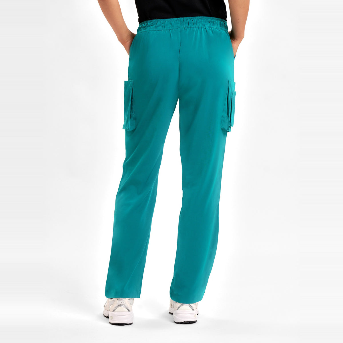 Inaura Avery Womens Straight Leg Scrub Pant CSP944LL in Teal, worn by model, view 4