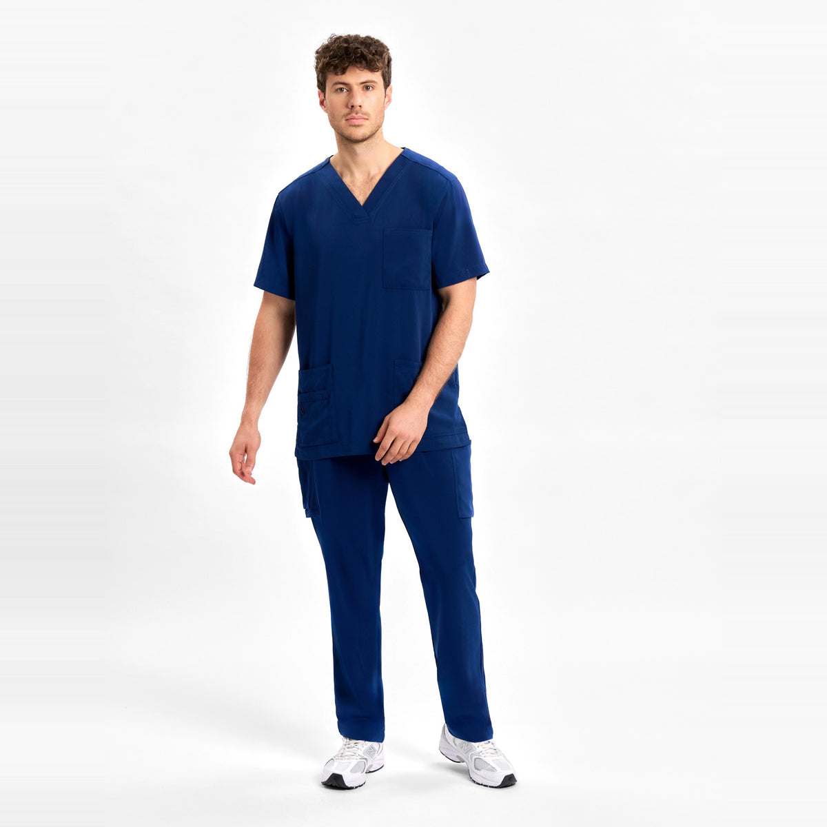 Inaura Avery Mens Straight Leg Scrub Pant CSP946ML in Navy, worn by model