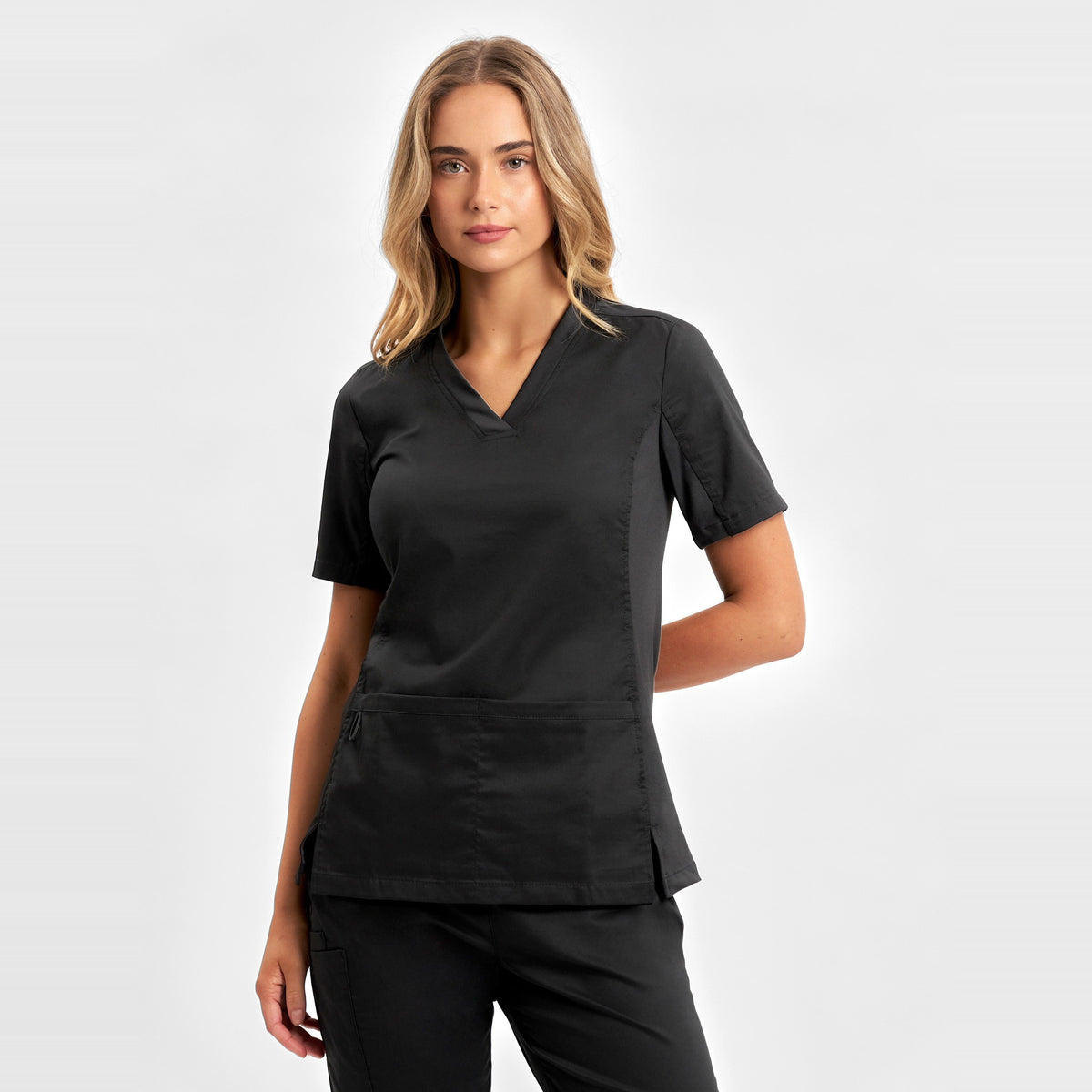 Inaura Riley Womens Stretch Scrub Top CST043LS in Black, worn by model