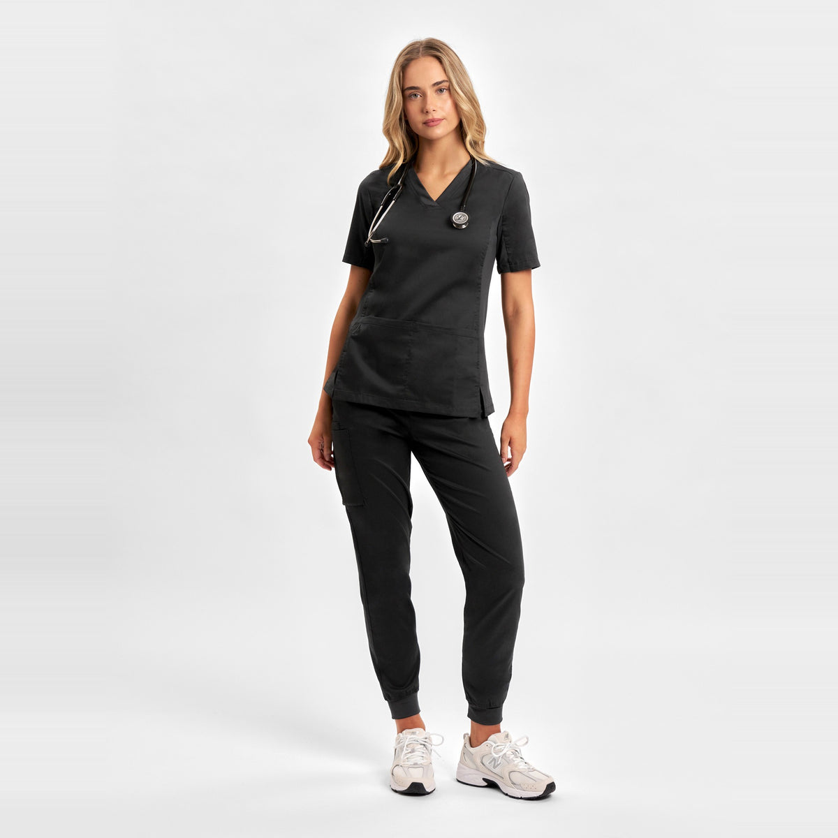 Inaura Riley Womens Stretch Scrub Top CST043LS in Black, worn by model, view 2