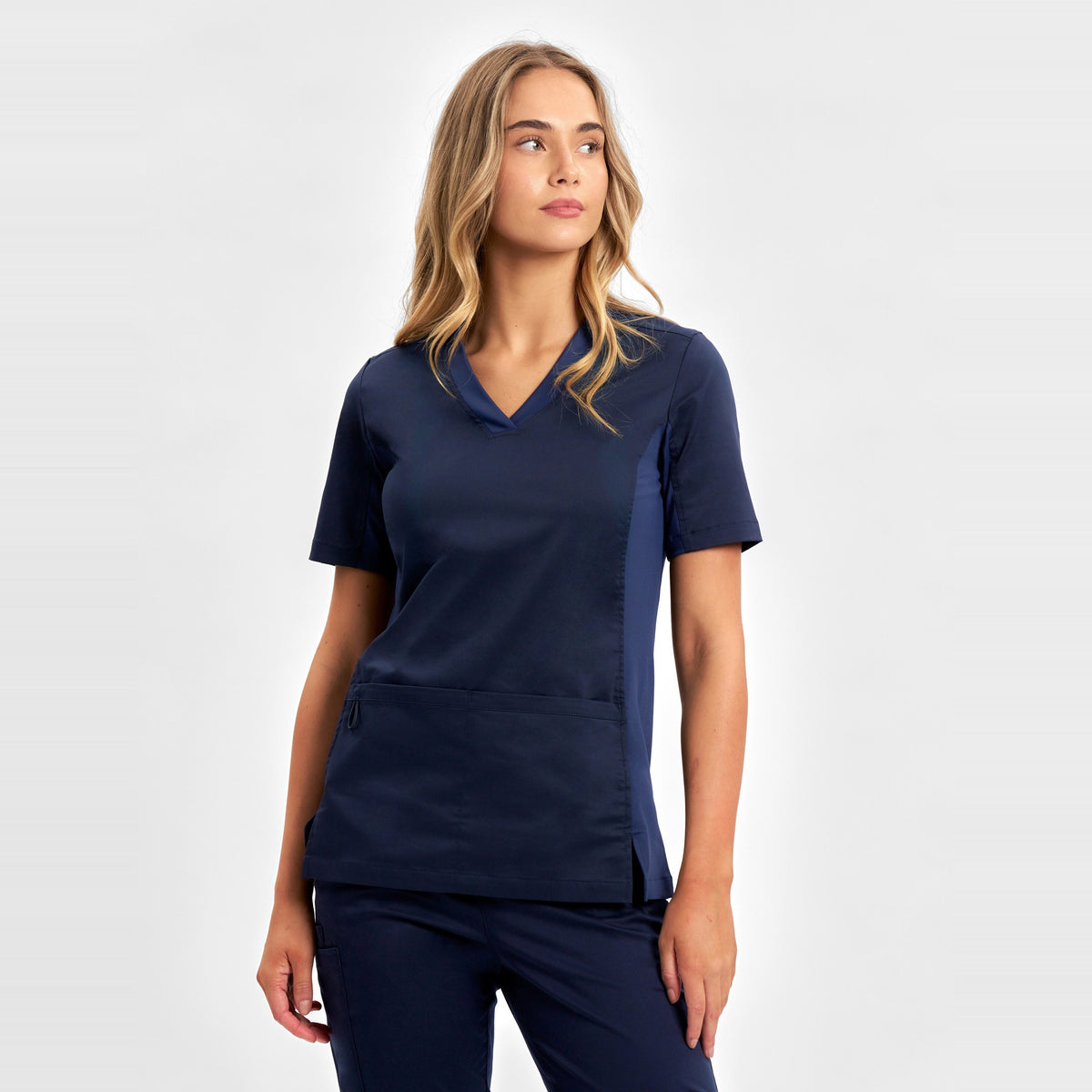 Inaura Riley Womens Stretch Scrub Top CST043LS in Midnight Navy, worn by model