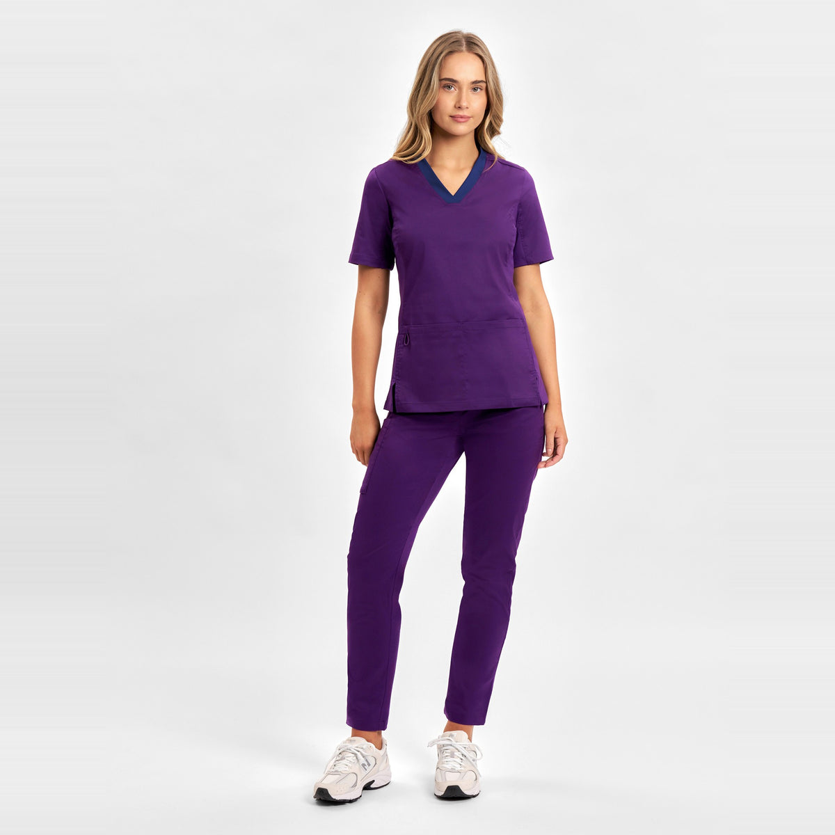 Inaura Riley Womens Stretch Scrub Top CST043LS in Purple, worn by model, view 2