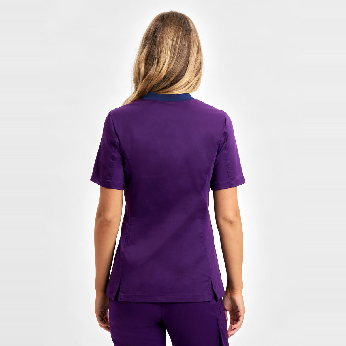 Inaura Riley Womens Stretch Scrub Top CST043LS in Purple, worn by model, view 4