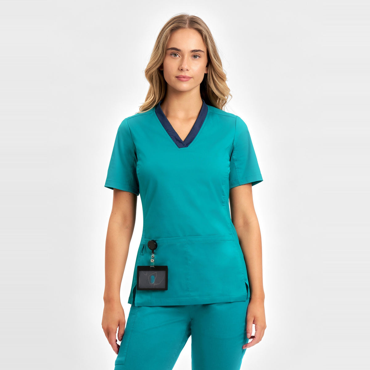 Inaura Riley Womens Stretch Scrub Top CST043LS in Teal, worn by model