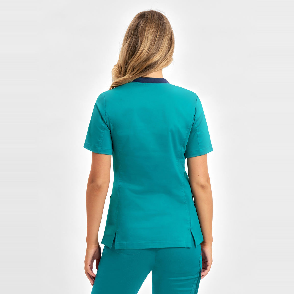 Inaura Riley Womens Stretch Scrub Top CST043LS in Teal, worn by model, view 4