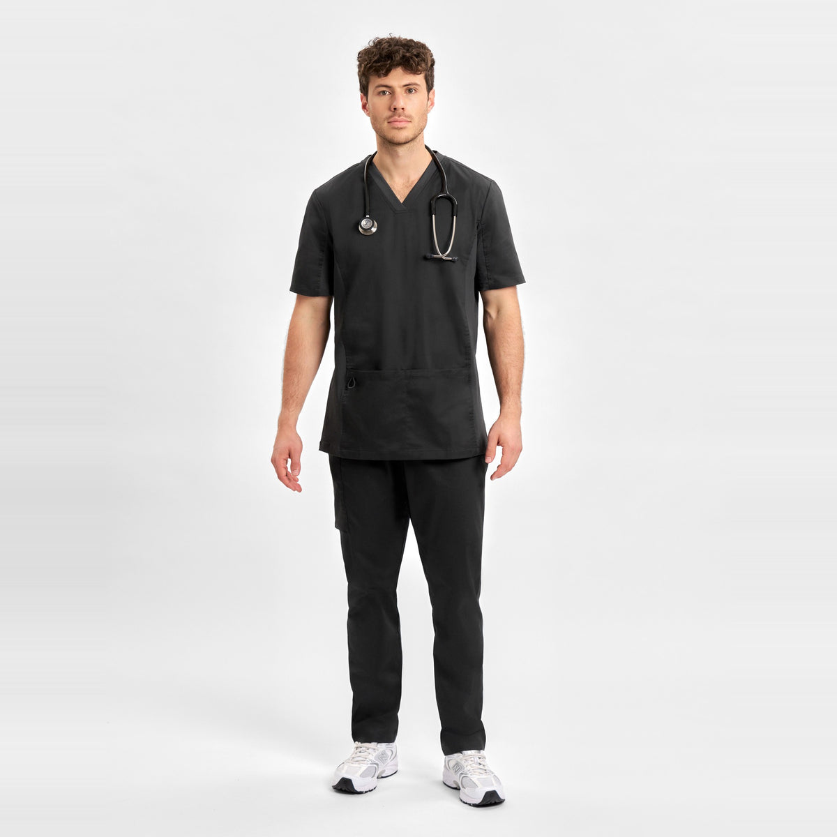Inaura Riley Mens Stretch Scrub Top CST043MS in Black, worn by model, view 2