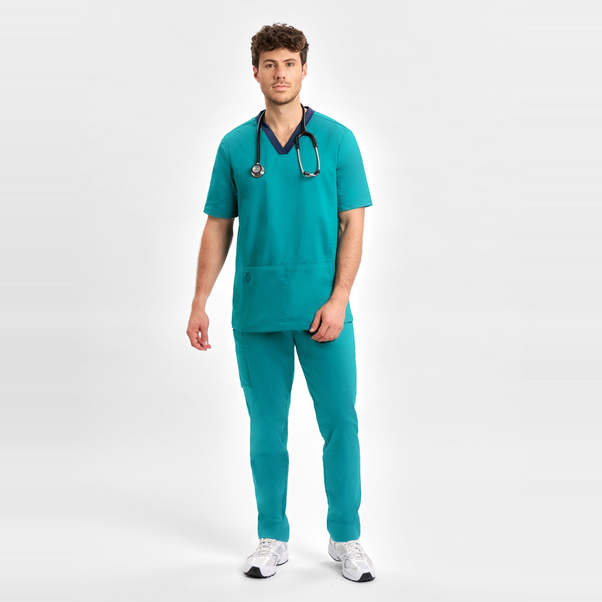 Inaura Riley Mens Stretch Scrub Top CST043MS in Teal, worn by model, view 2