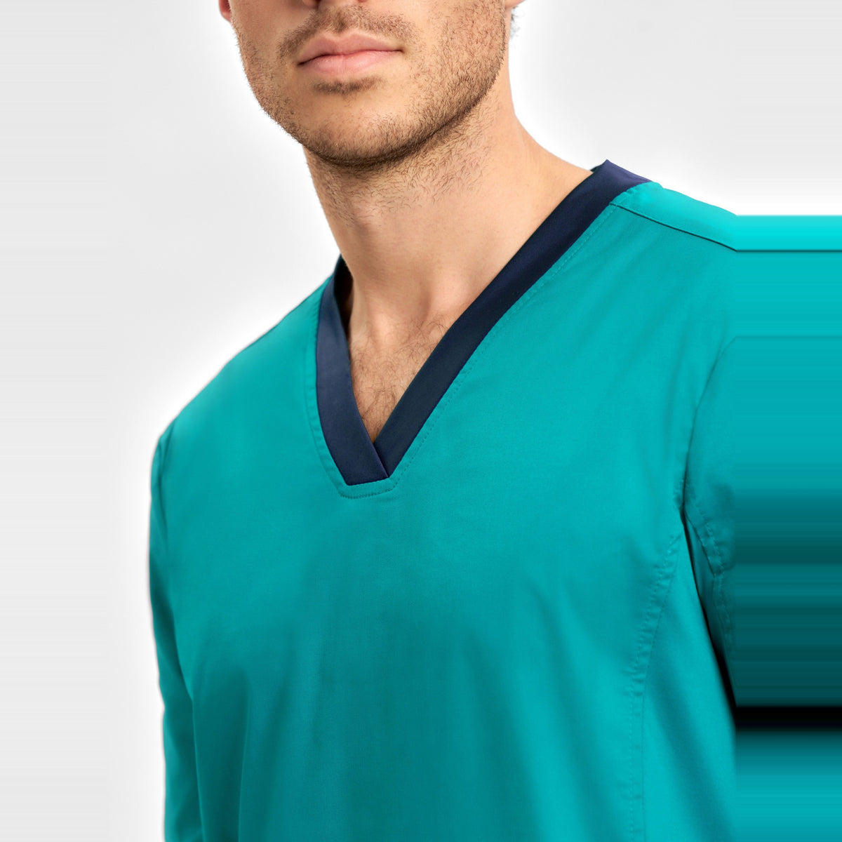 Inaura Riley Mens Stretch Scrub Top CST043MS in Teal, worn by model, view 5