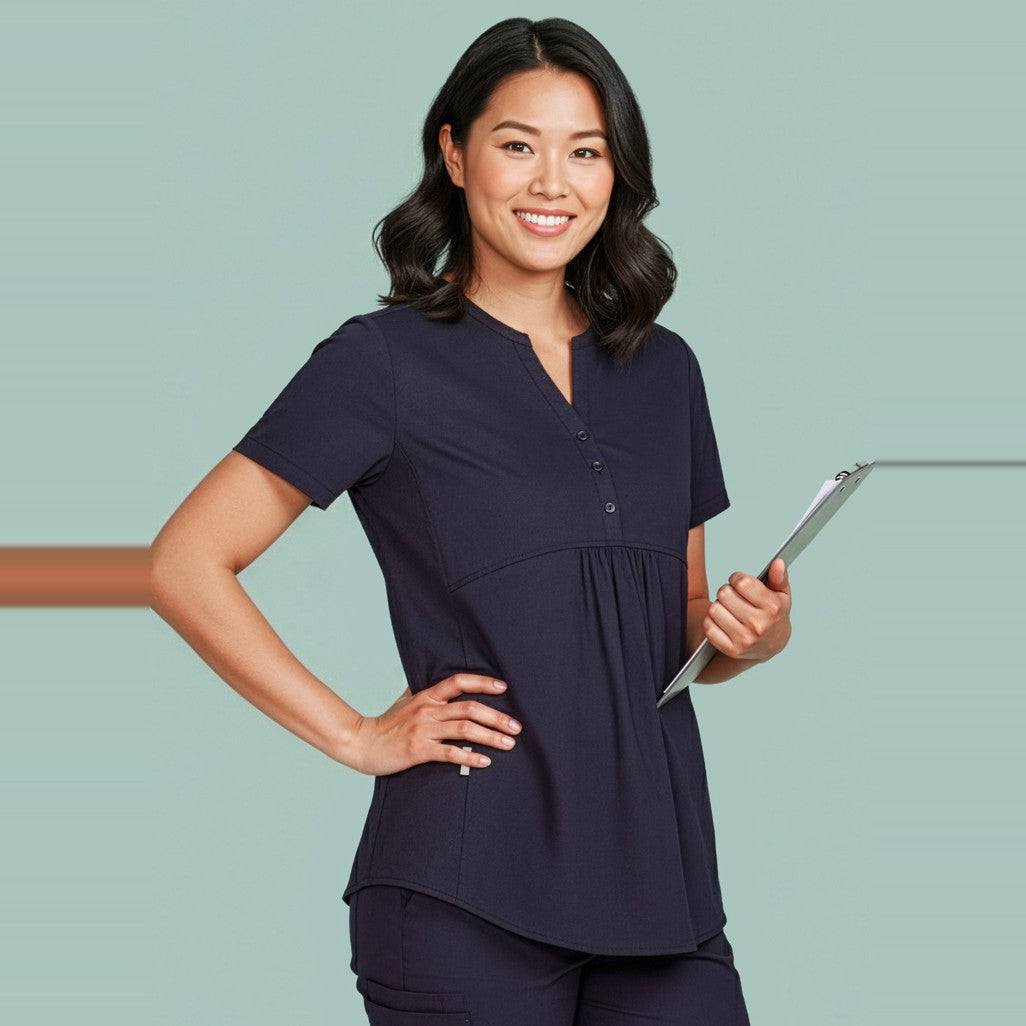 Inaura Rose Womens Tunic Scrub Top CST243LS in Midnight Navy, worn by model