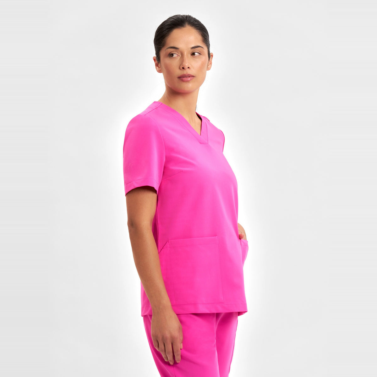 Inaura Pink Womens V-Neck Scrub Top CST245LS in Pink, worn by model, view 3