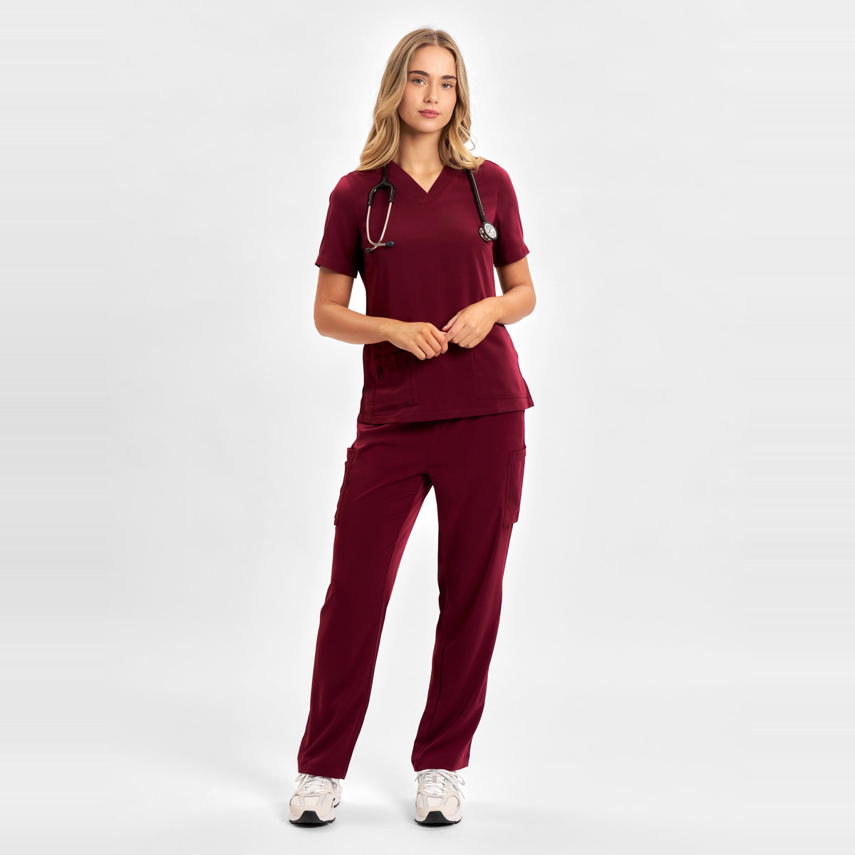 Inaura Avery Womens V-Neck Scrub Top CST941LS in Burgundy, worn by model, view 2
