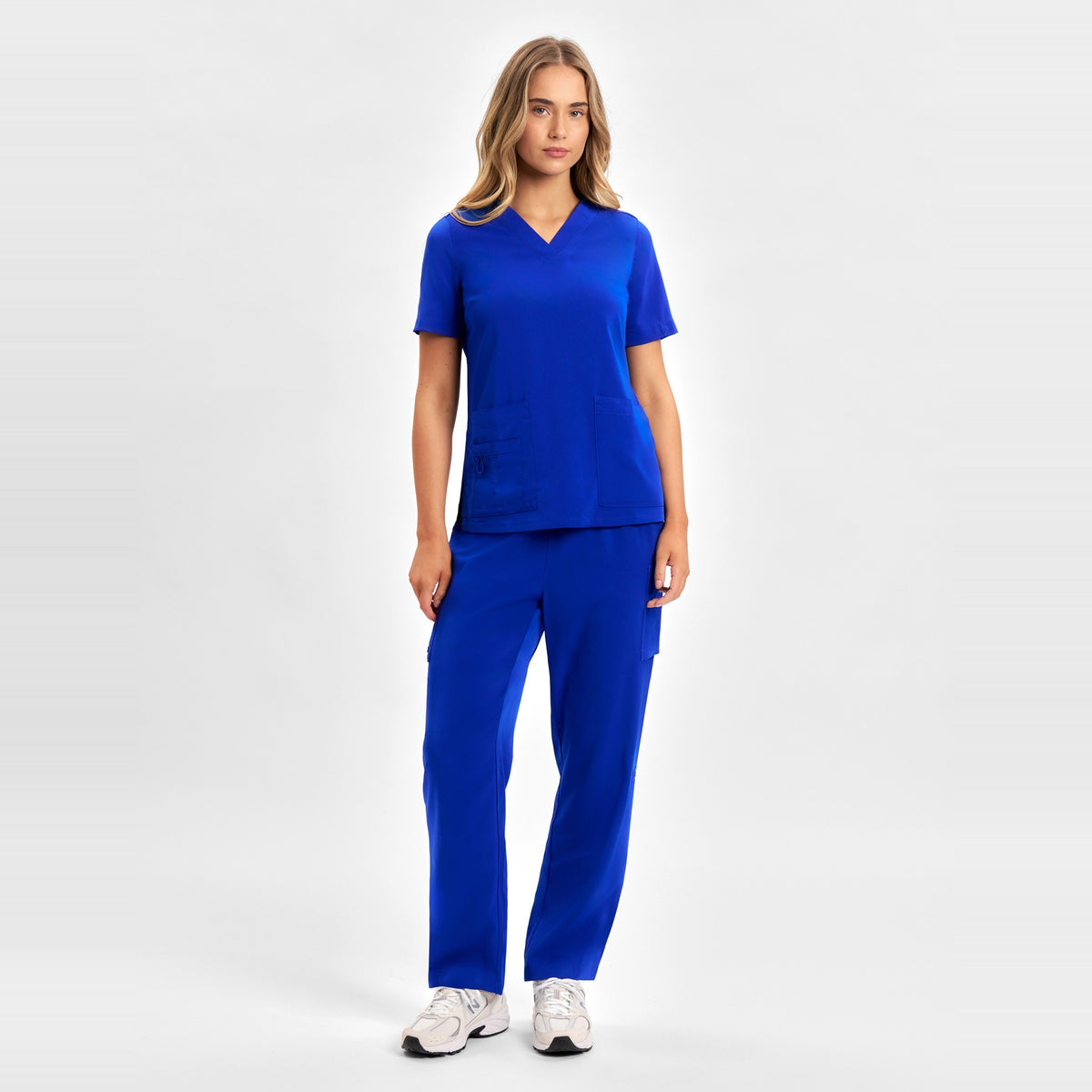 Inaura Avery Womens V-Neck Scrub Top CST941LS in Electric Blue, worn by model, view 2
