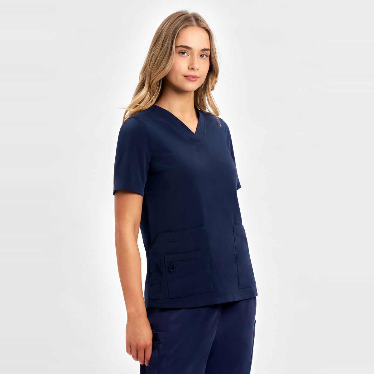 Inaura Avery Womens V-Neck Scrub Top CST941LS in Midnight Navy, worn by model, view 3