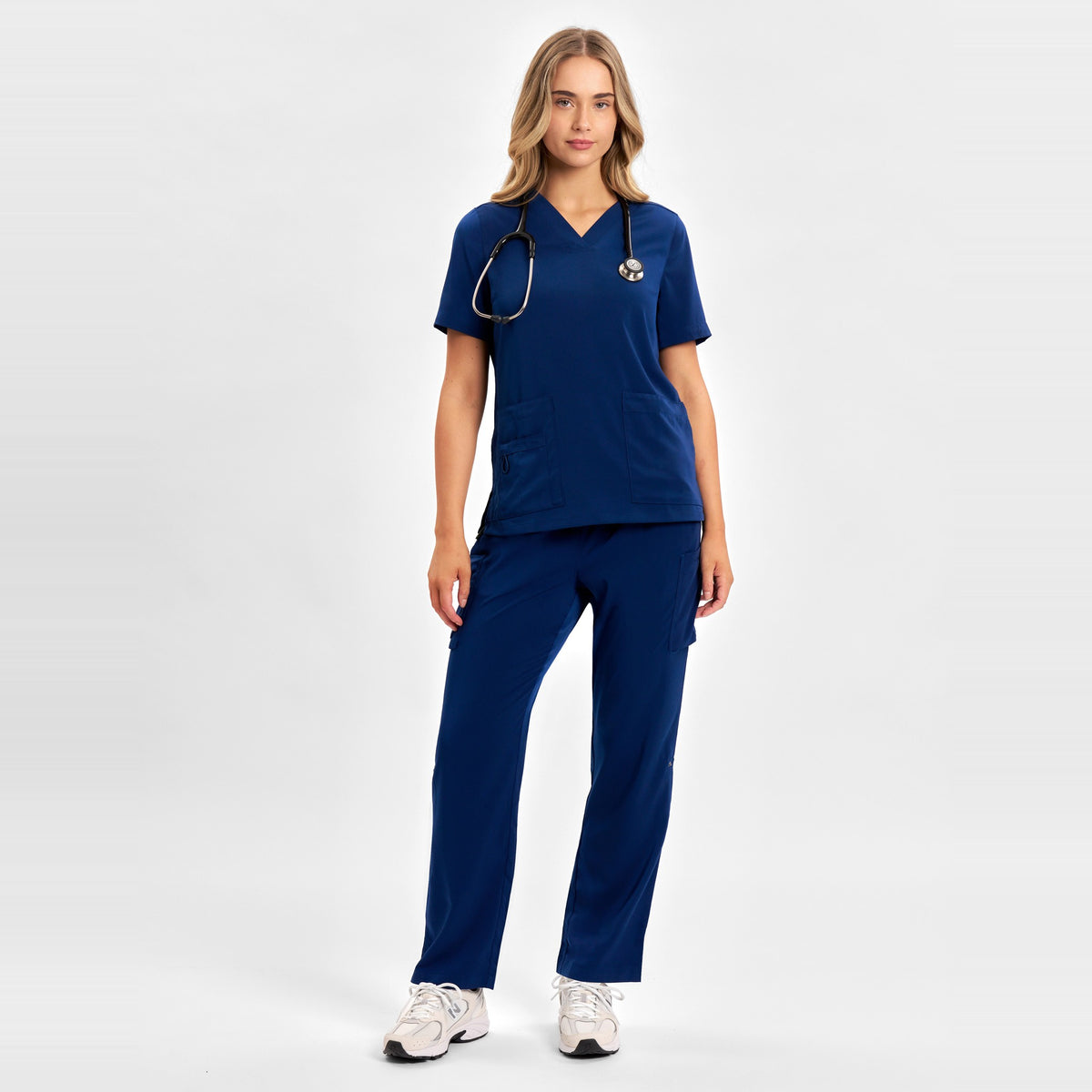 Inaura Avery Womens V-Neck Scrub Top CST941LS in Navy, worn by model, view 2