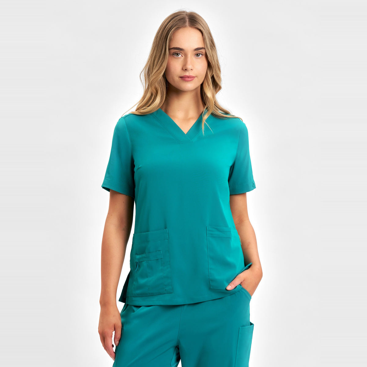 Inaura Avery Womens V-Neck Scrub Top CST941LS in Teal, worn by model