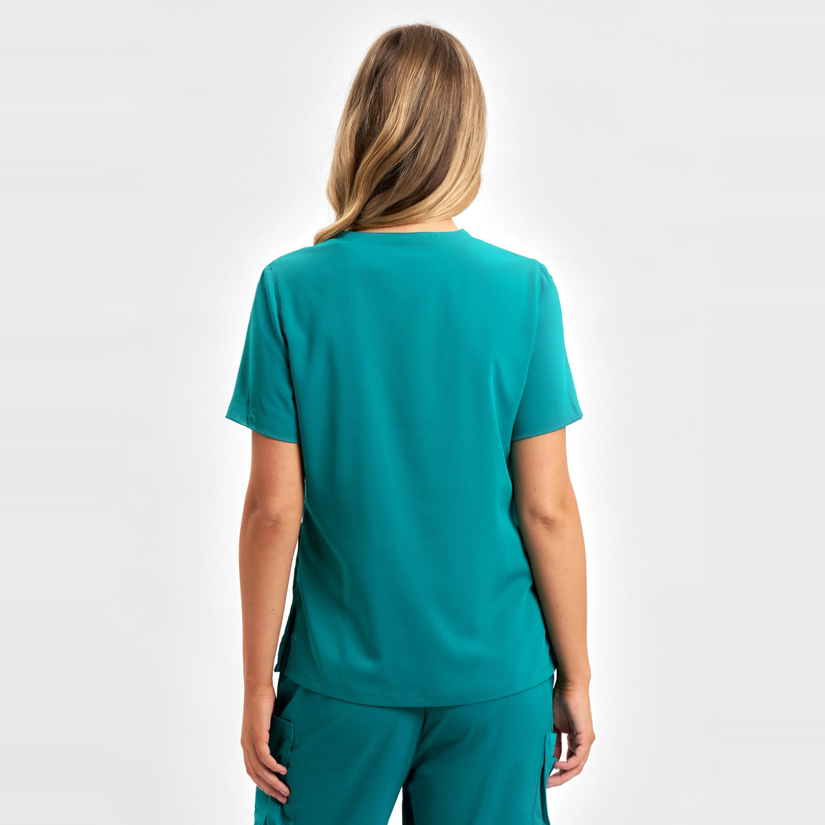 Inaura Avery Womens V-Neck Scrub Top CST941LS in Teal, worn by model, view 4