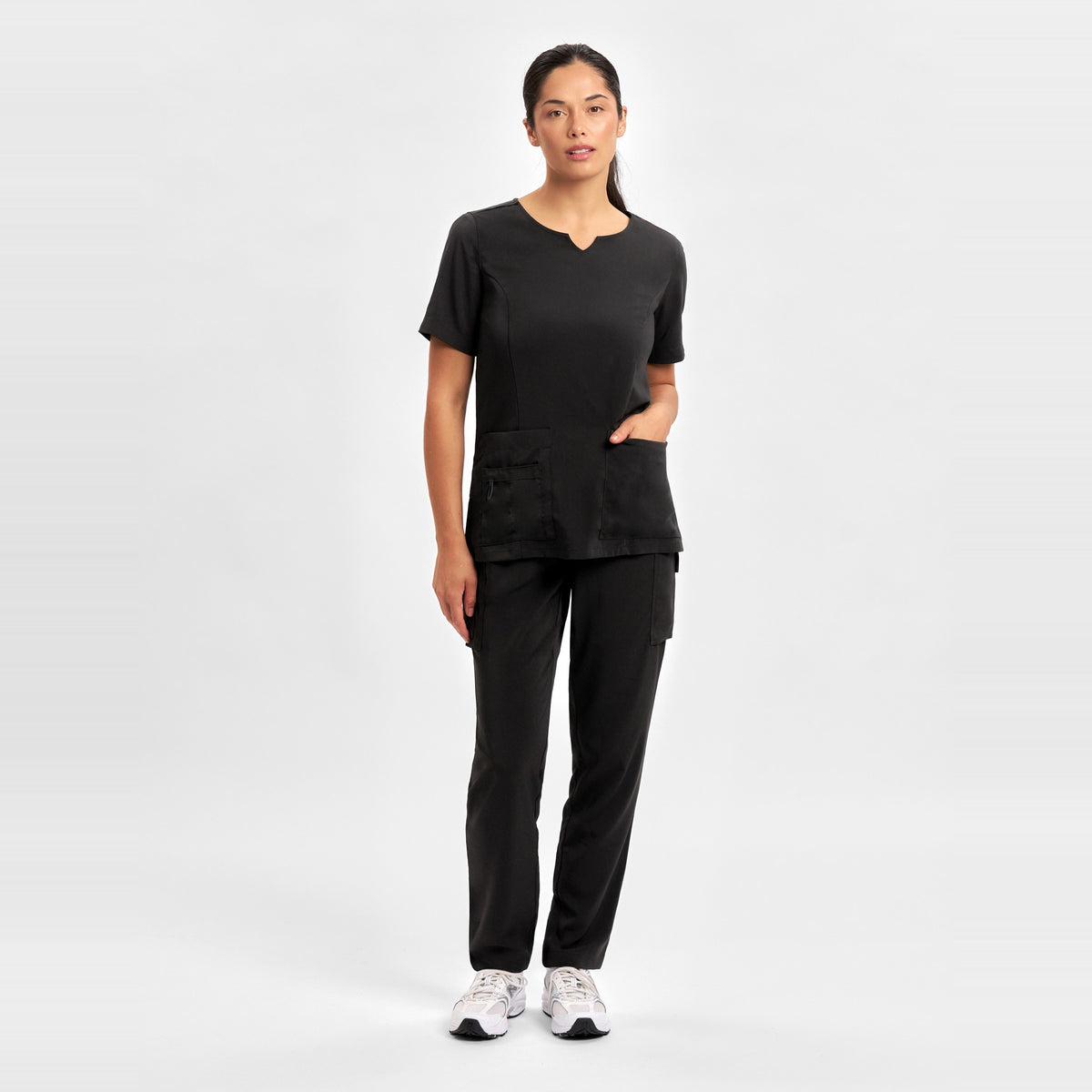 Inaura Avery Womens Round Neck Scrub Top CST942LS in Black, worn by model, view 2
