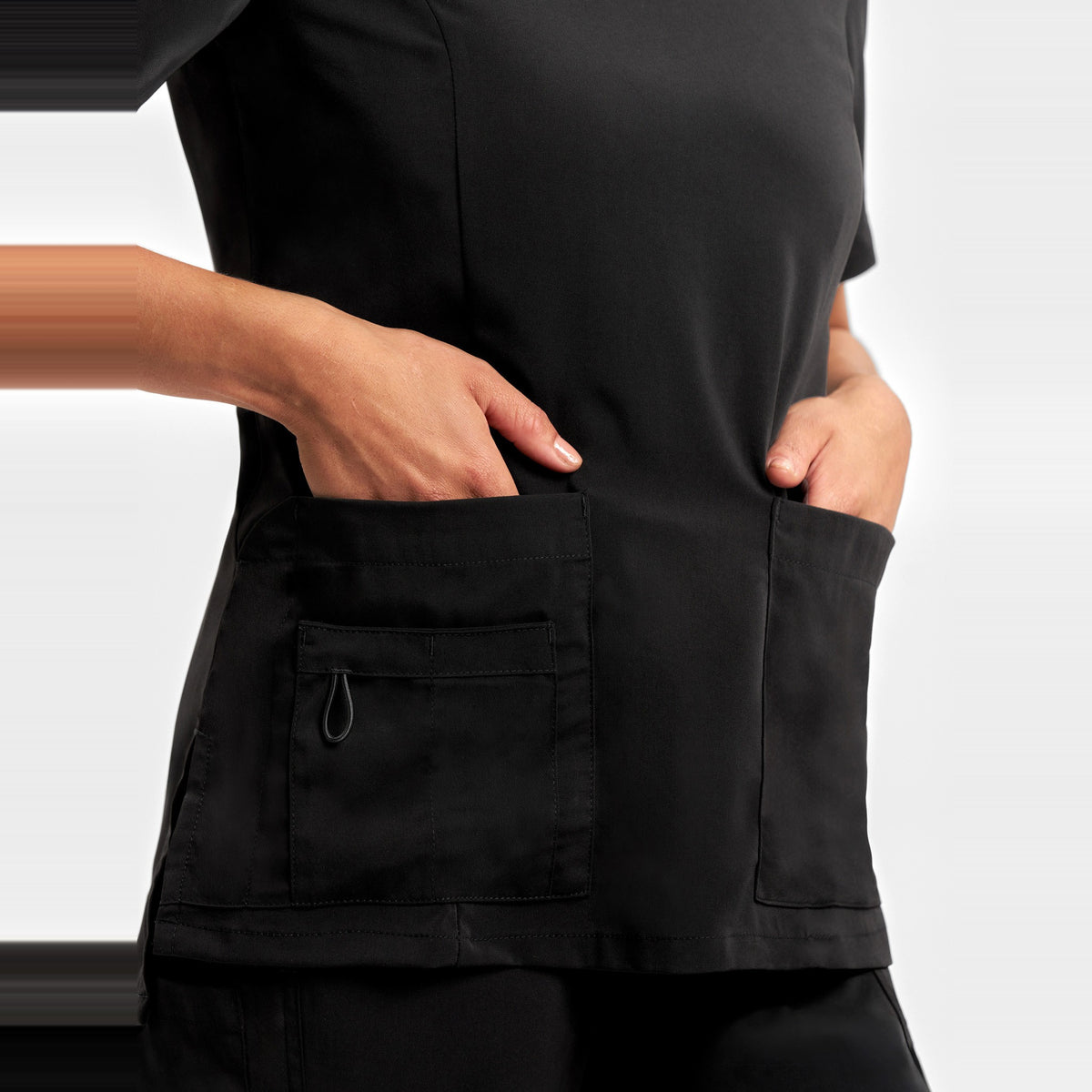 Inaura Avery Womens Round Neck Scrub Top CST942LS in Black, worn by model, view 5