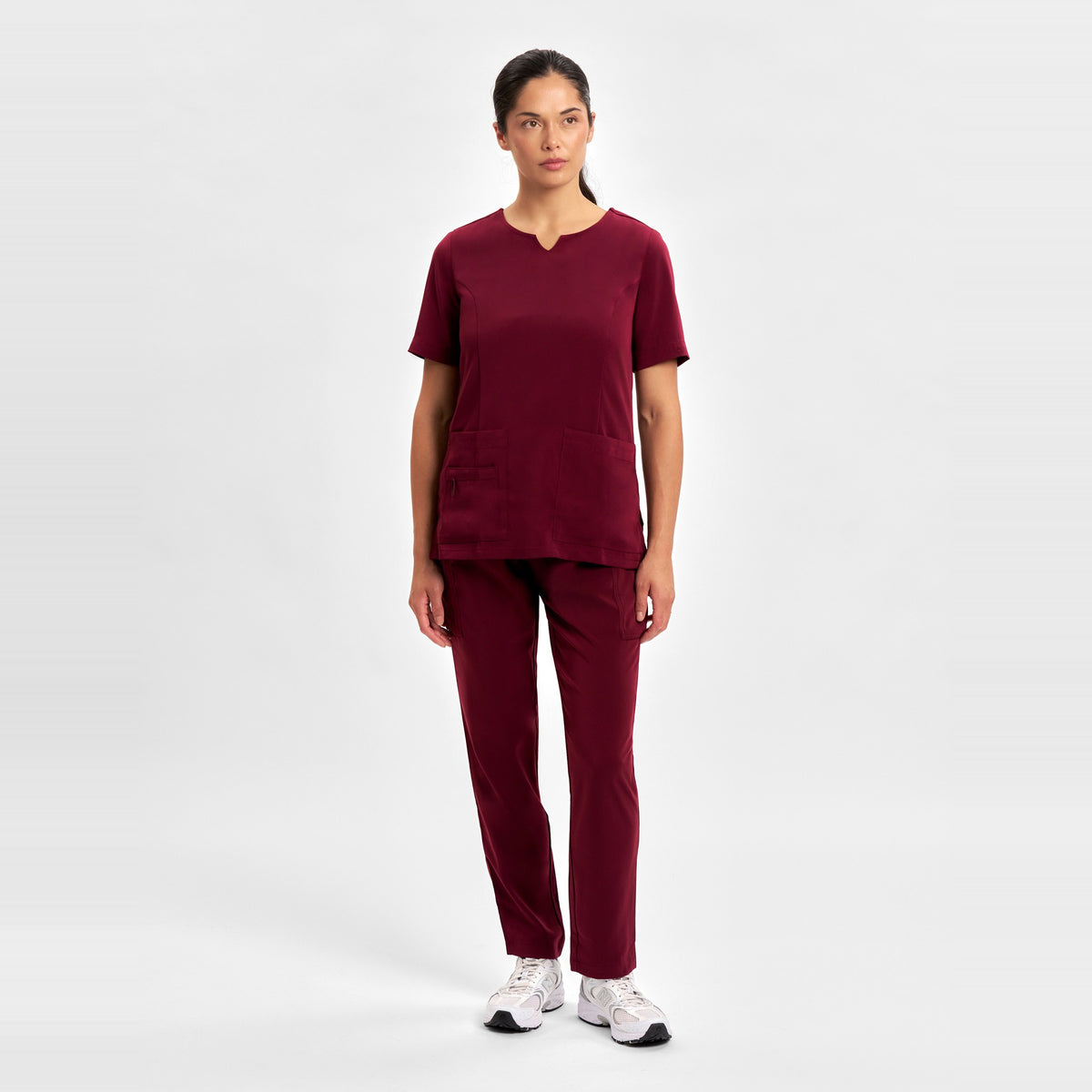 Inaura Avery Womens Round Neck Scrub Top CST942LS in Burgundy, worn by model, view 2