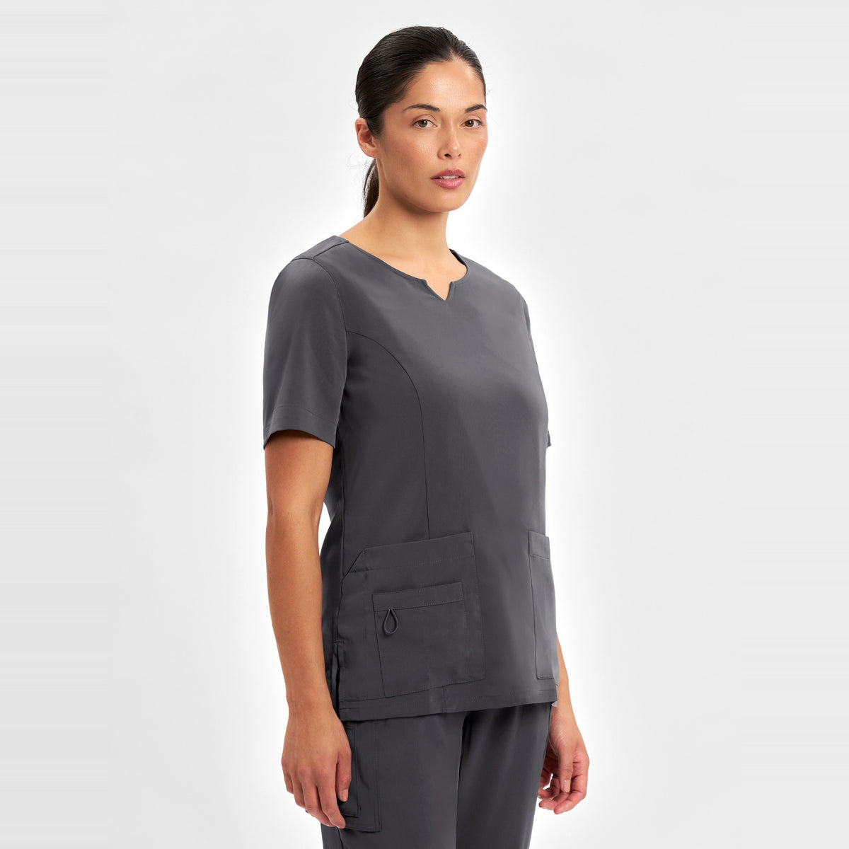Inaura Avery Womens Round Neck Scrub Top CST942LS in Charcoal, worn by model, view 3